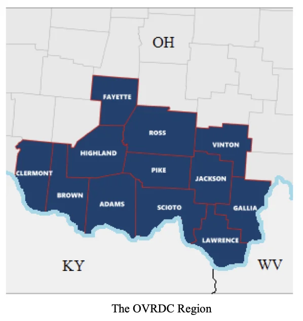 Screen Shot 2021-09-29 at 2.54.18 PM Map of The OVRDC Region in Southern Ohio, highlighting the following counties in dark blue: Fayette, Ross, Vinton, Highland, Pike, Jackson, Clermont, Brown, Adams, Scioto, Gallia, and Lawrence. The map shows the region bordering Kentucky (KY) and West Virginia (WV).
